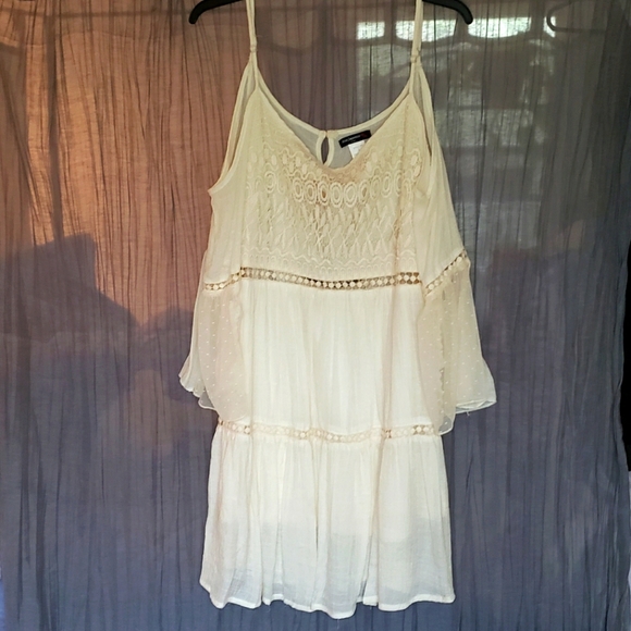 Off the shoulder, tiered mini dress. - Picture 1 of 7